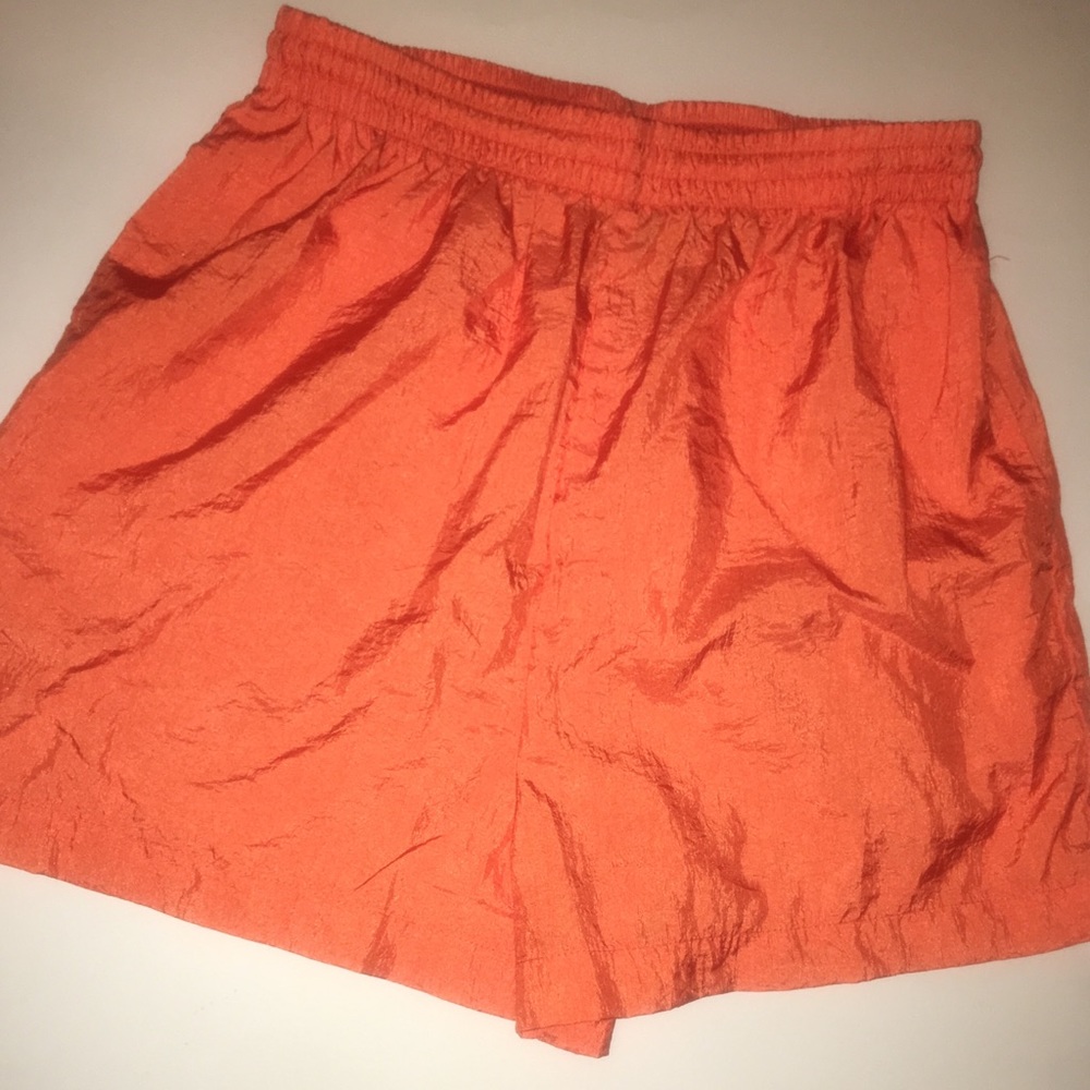Sports wear. Bright orange shorts. M/F like New